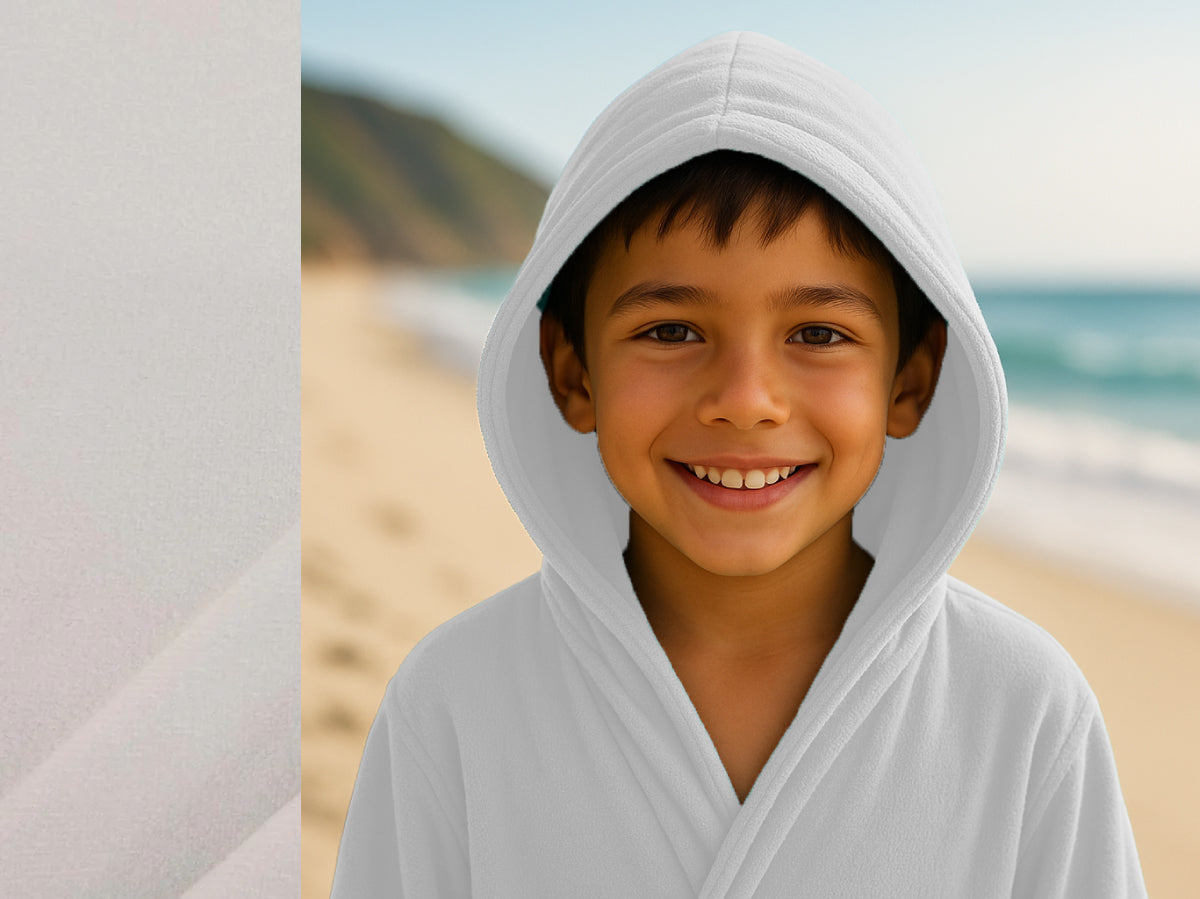 White towel hoodie on kid at beach – Bean Design