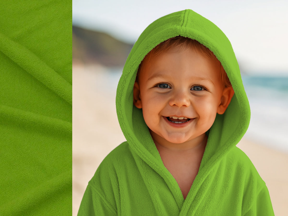 Green towel hoodie on toddler at beach – Bean Design