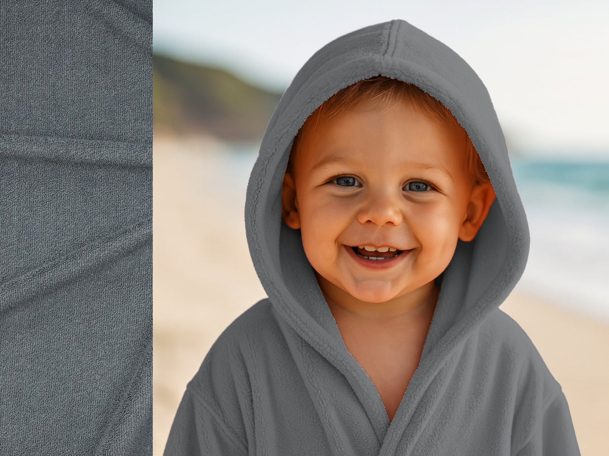Grey towel hoodie on toddler at beach – Bean Design