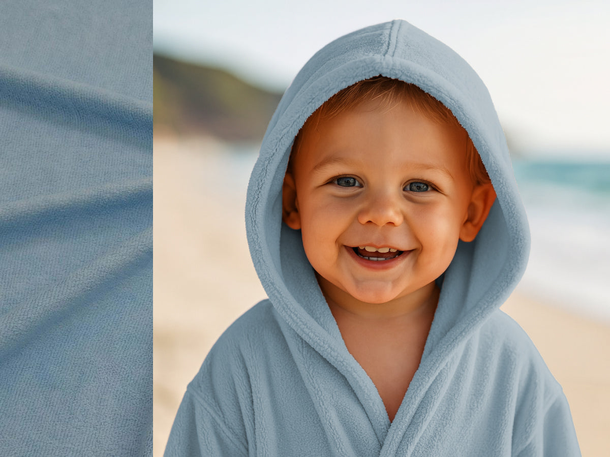 Light Blue towel hoodie on toddler at beach – Bean Design
