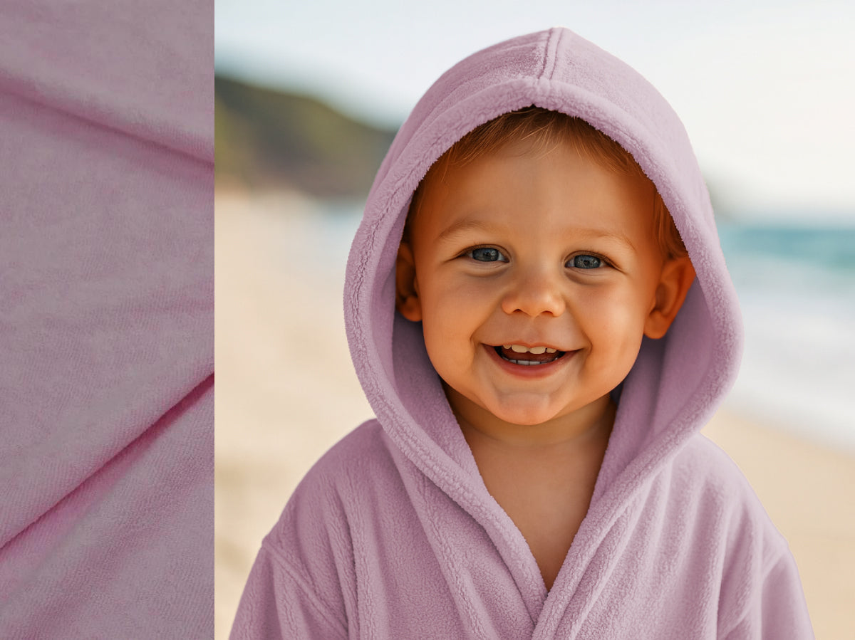 Light Pink towel hoodie on toddler at beach – Bean Design