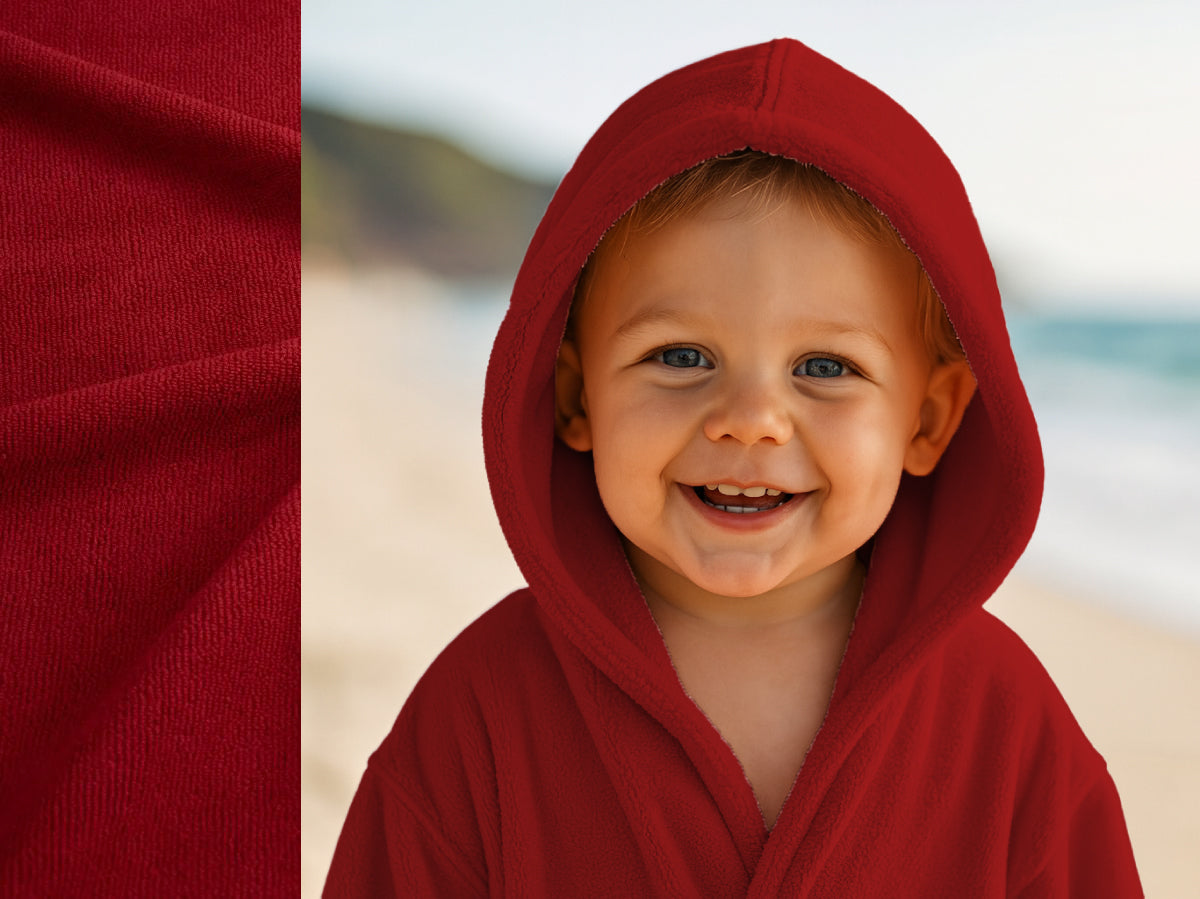 Red towel hoodie on toddler at beach – Bean Design