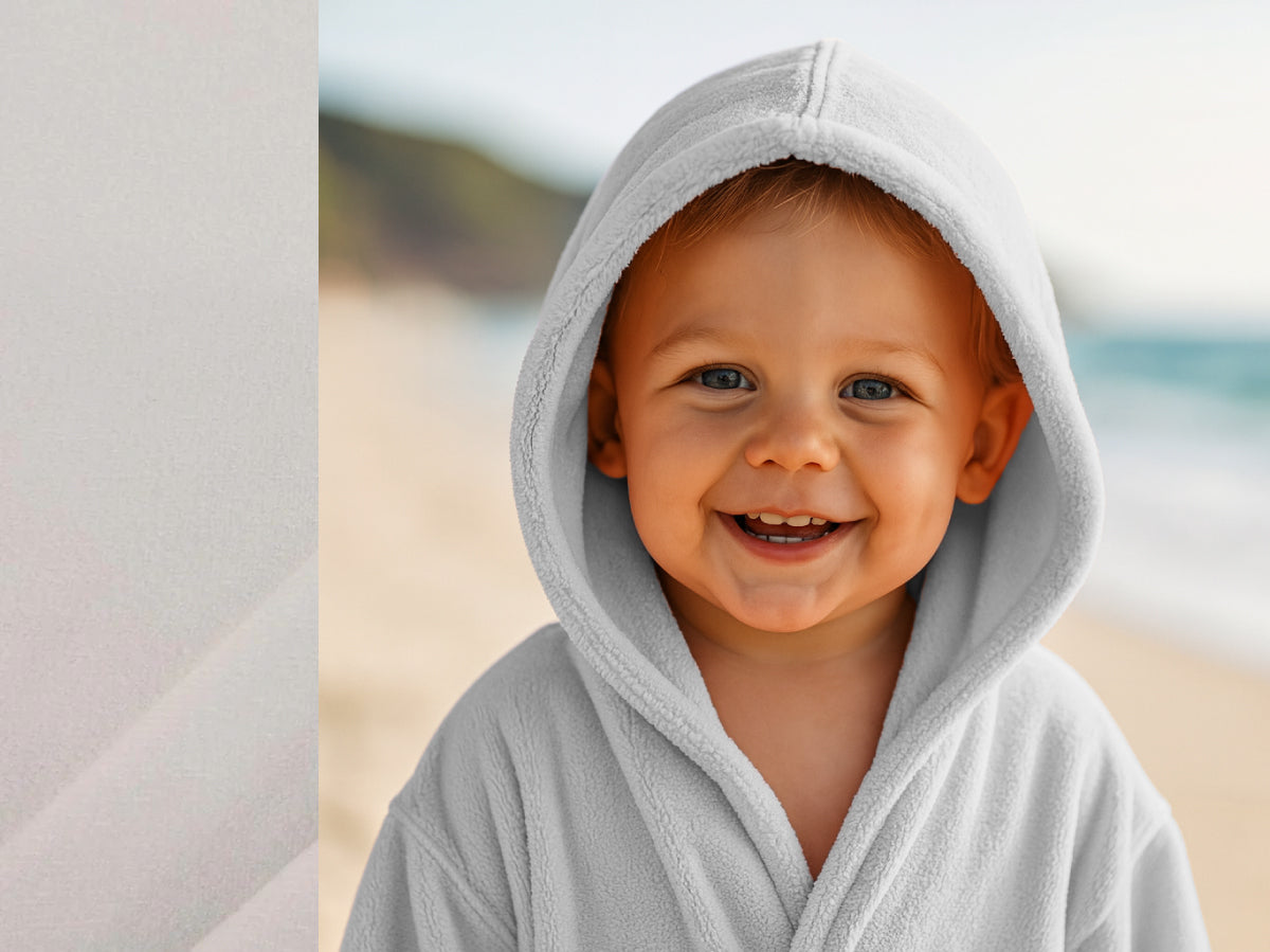 White towel hoodie on toddler at beach – Bean Design