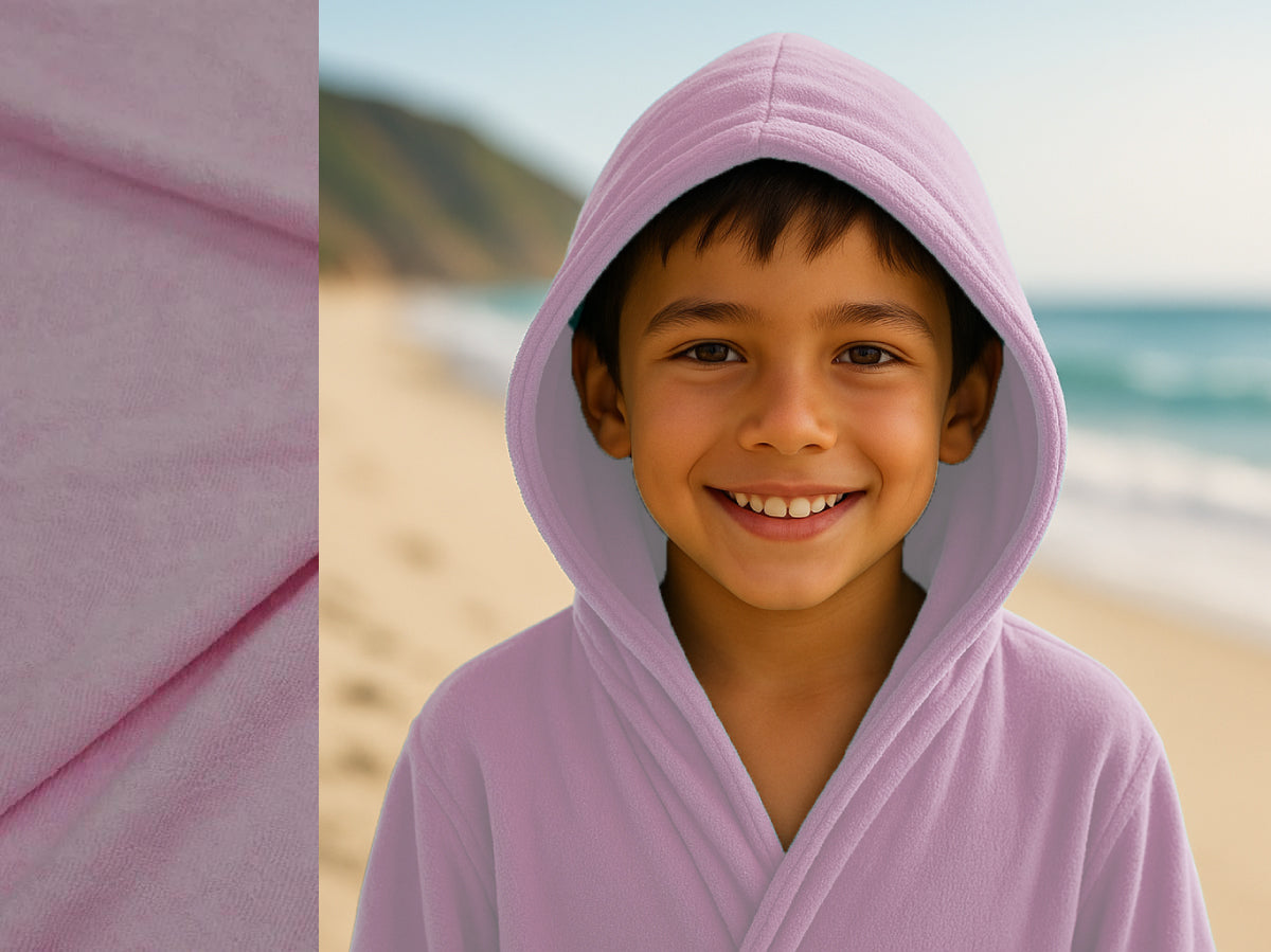Light Pink towel hoodie on kid at beach – Bean Design