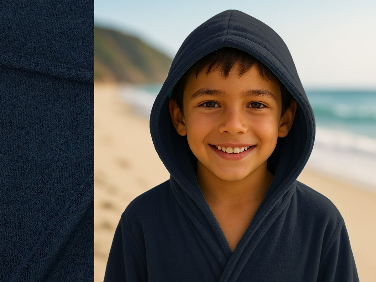 Navy towel hoodie on kid at beach – Bean Design