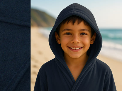 Navy towel hoodie on kid at beach – Bean Design