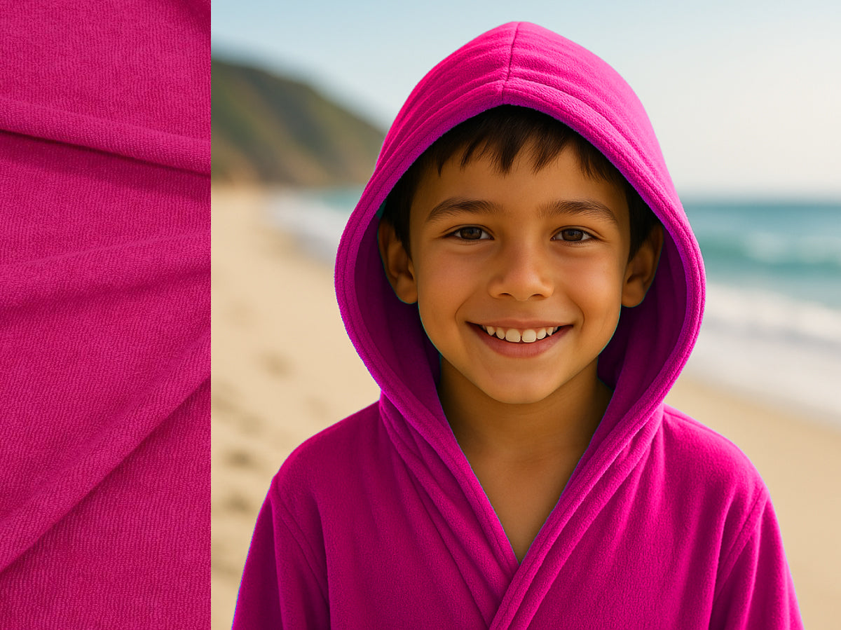 Pink towel hoodie on kid at beach – Bean Design
