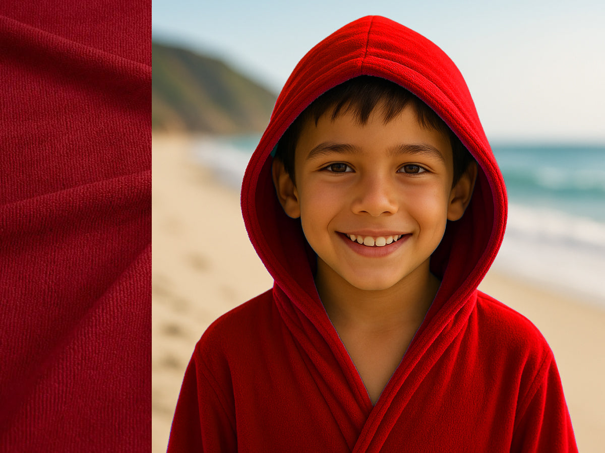 Red towel hoodie on kid at beach – Bean Design