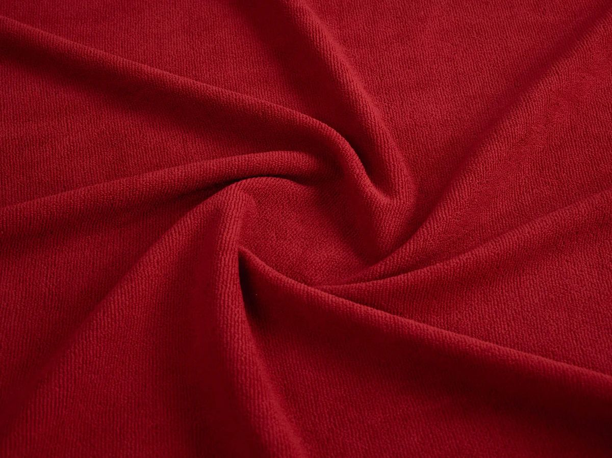 Close-up of red towel fabric from Bean Design hoodie