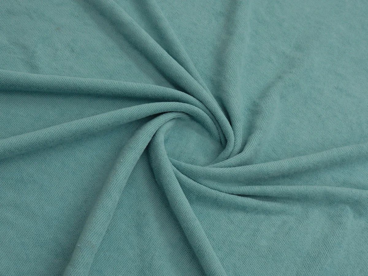 Close-up of teal towel fabric from Bean Design hoodie