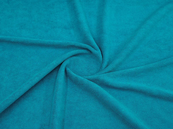 Close-up of turquoise towel fabric texture from Bean Design hoodie