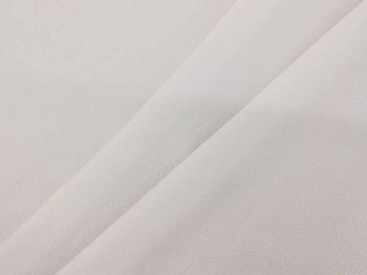 Close-up of white towel fabric texture from Bean Design hoodie